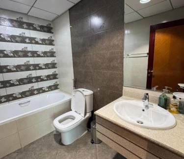 Rumailah Apartamento | sand and beach haven at Ajman Corniche!