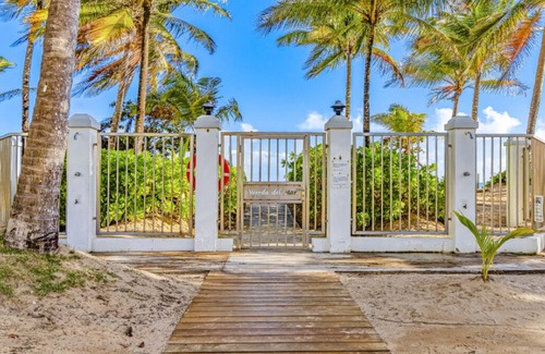 Zarzal Condominio | Sand Dollar Beachfront Condo! New upgrades, steps from the beach! Paradise!