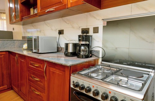 Entebbe Apartamento | Sand Grains Residence 001
