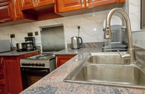 Entebbe Apartamento | Sand Grains Residences 001