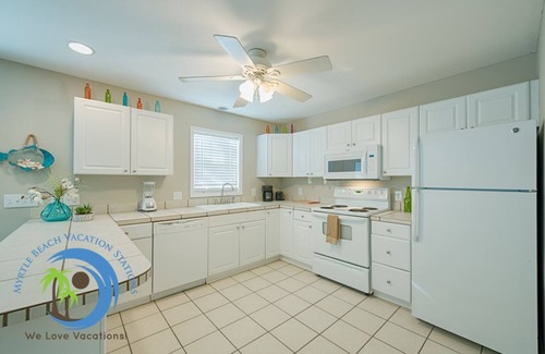 Crescent Beach Condominio | Sandcastle Down