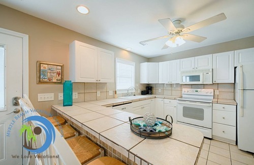 Crescent Beach Condominio | Sandcastle Up