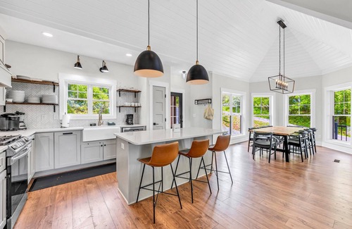 Moneta Casa | Sandy Bottom Cove, New Lakefront Luxury w/ Covered Decks + Heated Salt Pool, Beach, Hot Tub, Dock!