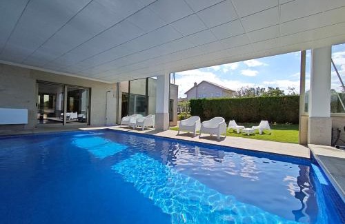 Sanxenxo Casa | Sanxenxo Casa Rial 47 con PISCINA CLIMATIZADA