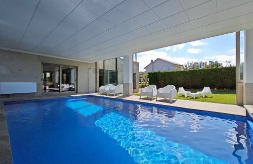 Sanxenxo Casa | Sanxenxo Casa Rial 47 con PISCINA CLIMATIZADA