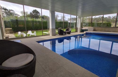 Sanxenxo Casa | Sanxenxo Casa Rial 47 con PISCINA CLIMATIZADA