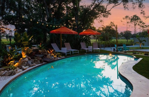 Whitfield Casa | Sara Bay Base Camp: Private Tropical Oasis, Pool, Golf, Bocce, Firepit, PETS
