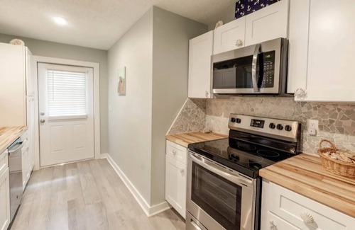 Bayou Oaks Casa | Sarasota Beach House themed designer cottage- sleeps 6 - pool- tropical oasis.