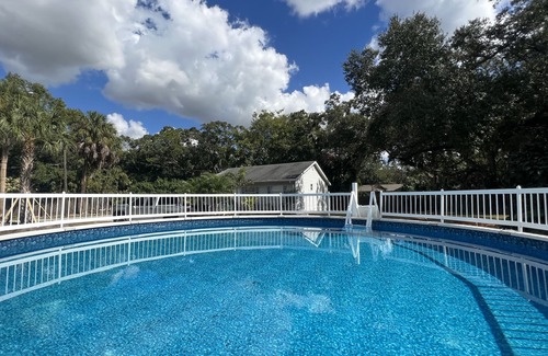 Bayou Oaks Casa | Sarasota Beach House themed designer cottage- sleeps 6 - pool- tropical oasis.