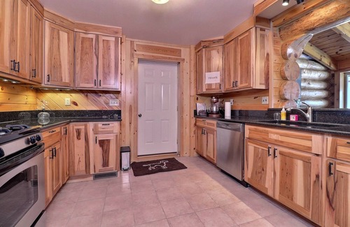 Fifield Casa | Scandinavian hand-scribed full log home on 31 acres and a quiet lake and trails