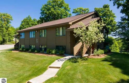 Kewadin Casa | Scenic AGaMing Escape Torch Lake Views and Golf