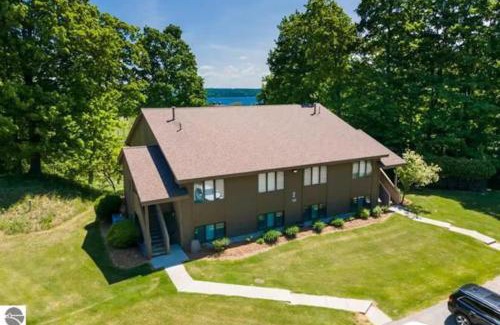 Kewadin Casa | Scenic AGaMing Escape Torch Lake Views and Golf