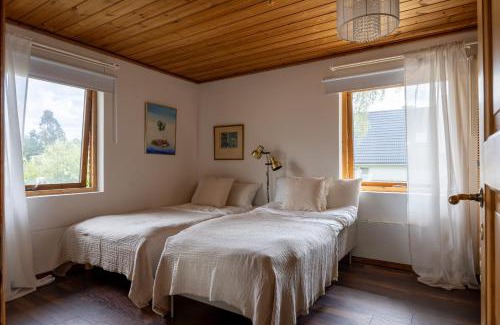 Huddinge Municipality Casa | Scenic Lakehouse near Stockholm with Sauna & Jetty