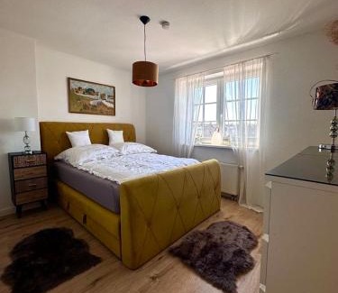 Rablinghausen Apartamento | Schön gelegene und gemütliche Ferienwohnung am Weserufer