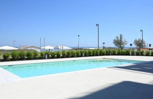 Senigallia Apartamento | SE125 - Senigallia, esclusivo trilocale fronte mare con piscina