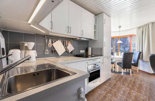 Friedrichskoog-Spitze Apartamento | Apartamento frente al mar "Zur Kajüte Friedrichskoog" con Wi-Fi, terraza y jardín