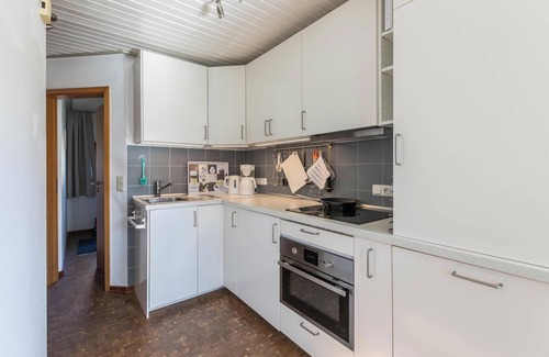 Friedrichskoog-Spitze Apartamento | Apartamento frente al mar "Zur Kajüte Friedrichskoog" con Wi-Fi, terraza y jardín