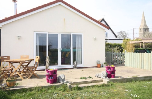 Mappleton Casa | Bungalow con vistas al mar, amplio plan abierto y admite mascotas.