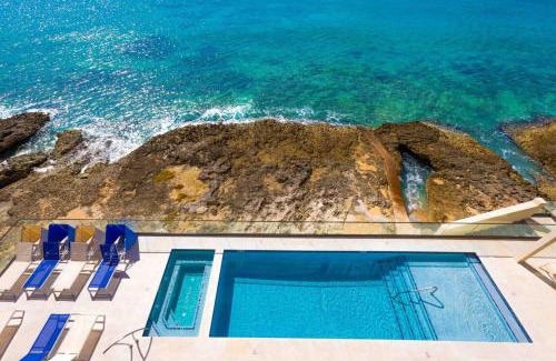 Northwest Point Apartamento | SeaDreams 8 - Luxury Condo with Shared Pool, Hot Tub, Rooftop Lounge