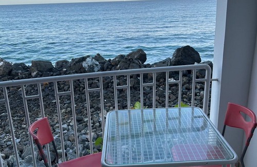 Stella Condominio | Seafront Sanctuary: Oceanfront Living 30 Feet from the Water at Going Coastal