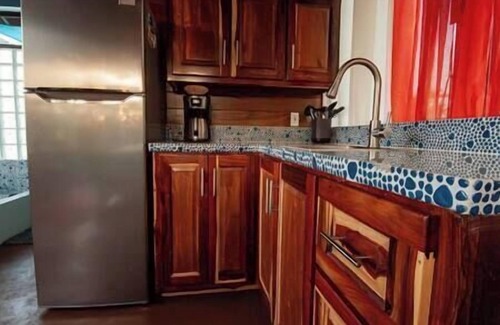 Sarteneja Apartamento | Seafront tropical lush landscaped, private Casita