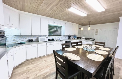 Spanish Wells Cabaña | Western View Cottage cerca de la playa con carrito de golf, 2 kayaks, tabla de paddle12 plazas