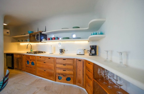 Cocoplum Condominio | Increíble, nueva suite de lujo frente al mar con piscina compartida, acceso a la playa