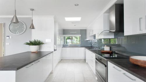 Salamander Bay Casa | Seaside Sanctuary - Waterfront Luxury Home with Heated Pool