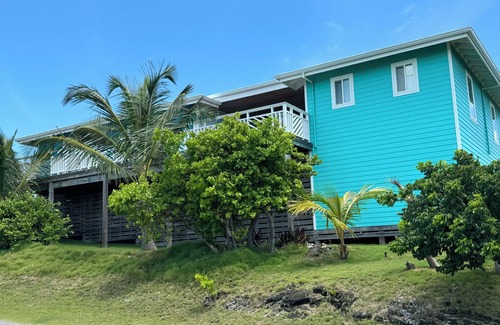 Great Guana Cay Apartamento | Temporadas en el sol 1.1 Verde Side Cottage-101 pasos del océano Atlántico