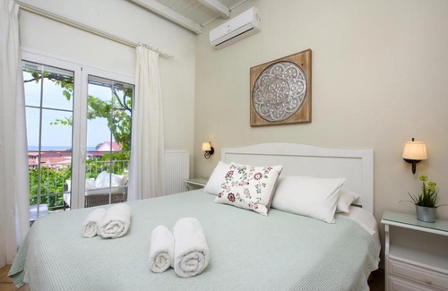 Agios Gordios Apartamento | Sebastian's - Garden Sea View Apartment