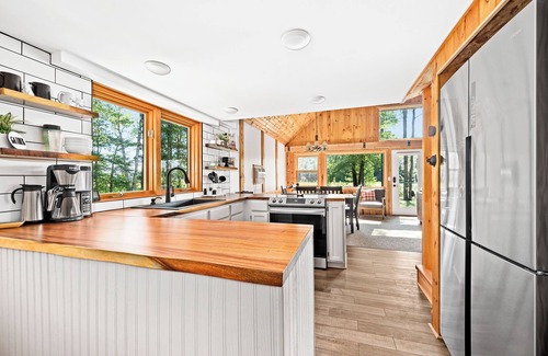 Hayward Casa | Secluded 4-season cabin w/private waterfront, epic game room & mins from trails