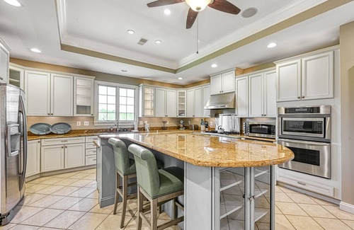 Sunrise Bay Casa | Secluded lakefront home with elevator, dock, private saltwater pool & hot tub
