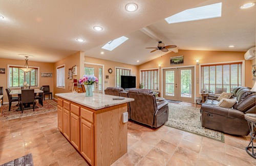 Crescent City Casa | Secluded riverfront getaway with firepit, deck, washer/dryer, & free WiFi