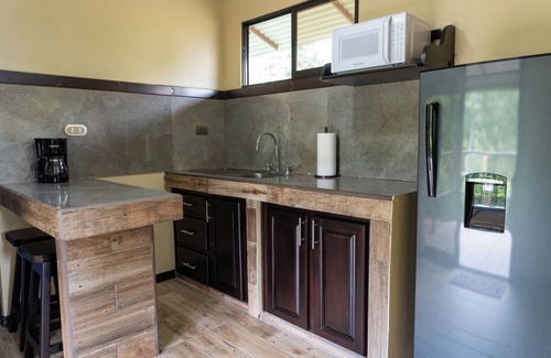 Río Cuarto Cabina | Selva Negra Loft: surrounded by mountains, rivers, lakes, and lush wildlife.