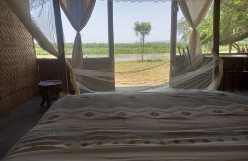 Western Region Cabina | Semliki Fishing River Camp