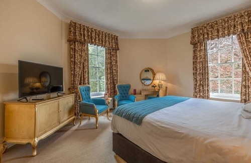 Nairn Hotel | Serene Getaway Steps from the Beach & Historic Landmarks