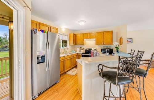 Keaau Casa | Serene home near beaches with a covered lanai, beach gear, W/D, and partial AC