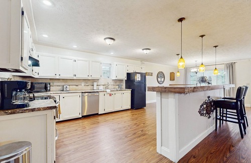 Caryville Cabina | Serene lake home with foosball, dartboard, luxe kitchen - dog friendly!