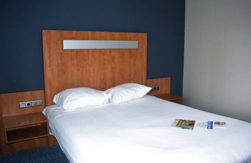 Made Hotel | Serene Made Getaway Steps from Local Dining, National & Theme Park Adventures