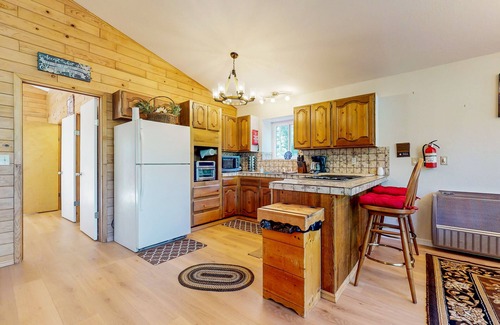 Shingletown Casa | Serene retreat w/2 kitchens, 2 living rooms, huge deck+ hot tub-creekfront view