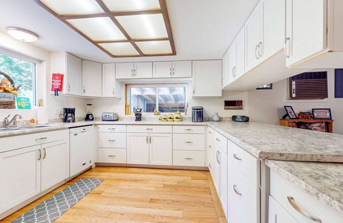 Shingletown Casa | Serene retreat w/2 kitchens, 2 living rooms, huge deck+ hot tub-creekfront view