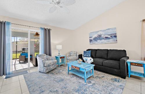 Indialantic Casa | Serene Seaside Retreat - Dog friendly - 2BR Townhouse with Shared Heated Pool Steps to Paradise Beach!
