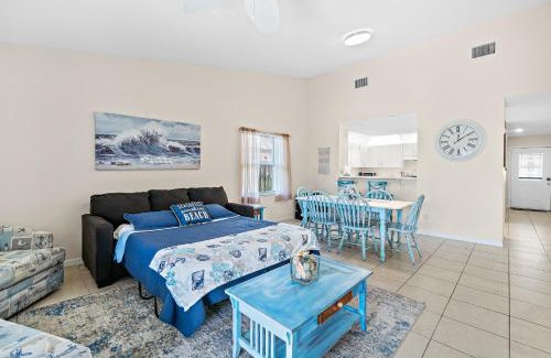 Indialantic Casa | Serene Seaside Retreat - Dog friendly - 2BR Townhouse with Shared Heated Pool Steps to Paradise Beach!