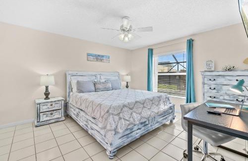 Indialantic Casa | Serene Seaside Retreat - Dog friendly - 2BR Townhouse with Shared Heated Pool Steps to Paradise Beach!