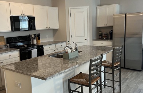 Southport Casa | Serenity in Southport. Family sized home. Pet friendly!