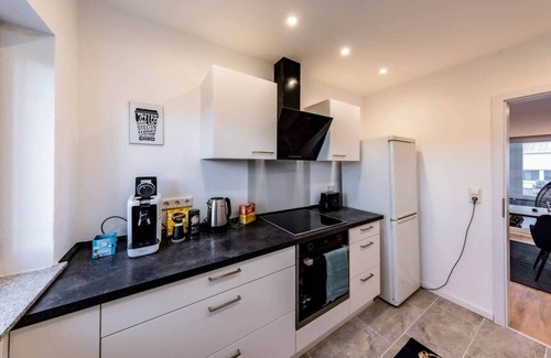 Hulzweiler Apartamento | Serviced apartment with fully furnished workspace