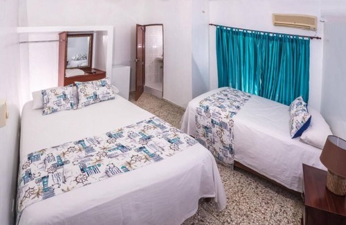 Ensanche Isabelita Hotel | Setup Hotels