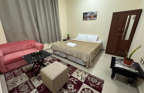 Al Ain Casa | Shared bath rooms only
