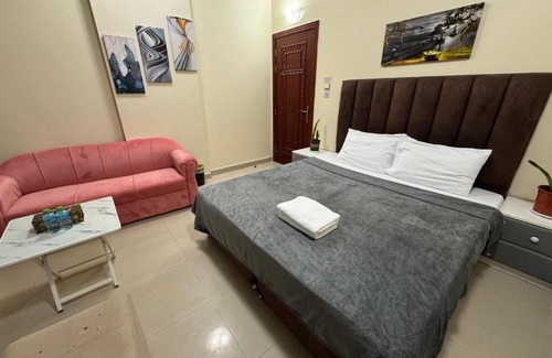 Al Ain Casa | Shared bath rooms only