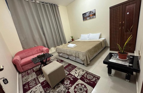 Al Ain Casa | Shared bath rooms only